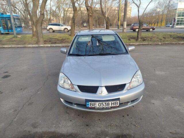 Сірий Міцубісі Lancer, об'ємом двигуна 1.6 л та пробігом 300 тис. км за 4200 $, фото 1 на Automoto.ua