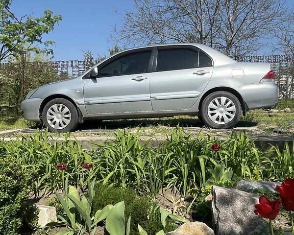 Сірий Міцубісі Lancer, об'ємом двигуна 1.6 л та пробігом 274 тис. км за 3700 $, фото 1 на Automoto.ua
