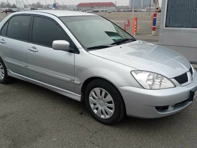 Сірий Міцубісі Lancer, об'ємом двигуна 1.6 л та пробігом 225 тис. км за 5500 $, фото 1 на Automoto.ua