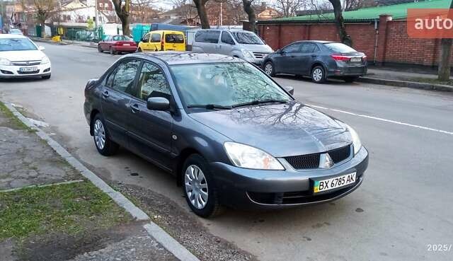 Міцубісі Lancer 2007 у Хмельницькому на Automoto.ua Сірий Міцубісі Lancer, об'ємом двигуна 1.58 л та пробігом 143 тис. км за 4100 $, фото 1 на Automoto.ua