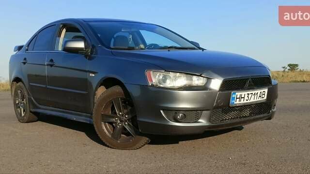 Сірий Міцубісі Lancer, об'ємом двигуна 2 л та пробігом 240 тис. км за 9500 $, фото 1 на Automoto.ua