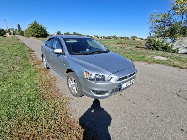 Серый Мицубиси Лансер, объемом двигателя 2 л и пробегом 224 тыс. км за 5500 $, фото 1 на Automoto.ua