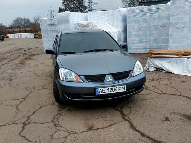 Сірий Міцубісі Lancer, об'ємом двигуна 1.6 л та пробігом 200 тис. км за 4300 $, фото 1 на Automoto.ua