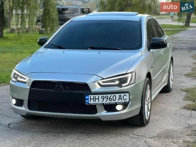 Сірий Міцубісі Lancer, об'ємом двигуна 2 л та пробігом 299 тис. км за 6700 $, фото 1 на Automoto.ua