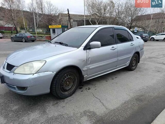 Сірий Міцубісі Lancer, об'ємом двигуна 1.6 л та пробігом 222 тис. км за 2200 $, фото 1 на Automoto.ua