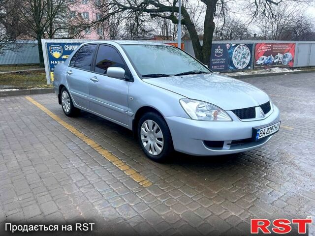 Серый Мицубиси Лансер, объемом двигателя 1.6 л и пробегом 223 тыс. км за 4700 $, фото 1 на Automoto.ua