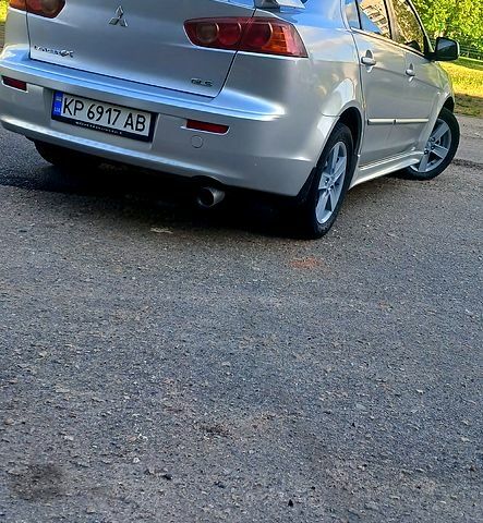 Сірий Міцубісі Lancer, об'ємом двигуна 2 л та пробігом 250 тис. км за 6700 $, фото 1 на Automoto.ua