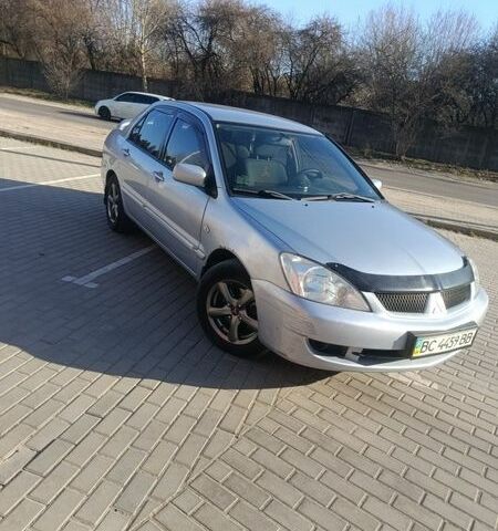 Серый Мицубиси Лансер, объемом двигателя 1.6 л и пробегом 270 тыс. км за 3000 $, фото 1 на Automoto.ua