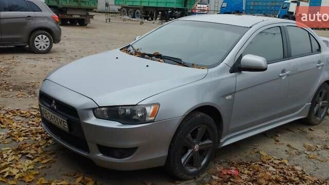 Серый Мицубиси Лансер, объемом двигателя 2 л и пробегом 305 тыс. км за 6300 $, фото 1 на Automoto.ua