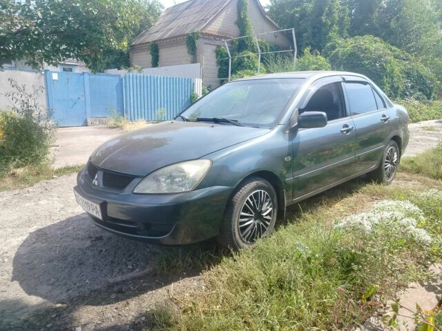 Сірий Міцубісі Lancer, об'ємом двигуна 1.6 л та пробігом 141 тис. км за 3503 $, фото 1 на Automoto.ua