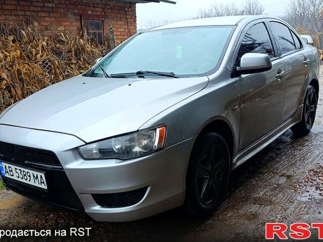 Серый Мицубиси Лансер, объемом двигателя 1.5 л и пробегом 111 тыс. км за 5200 $, фото 1 на Automoto.ua