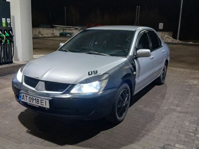 Сірий Міцубісі Lancer, об'ємом двигуна 1.6 л та пробігом 260 тис. км за 2600 $, фото 1 на Automoto.ua