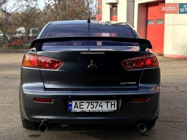 Серый Мицубиси Лансер, объемом двигателя 2 л и пробегом 220 тыс. км за 6600 $, фото 1 на Automoto.ua