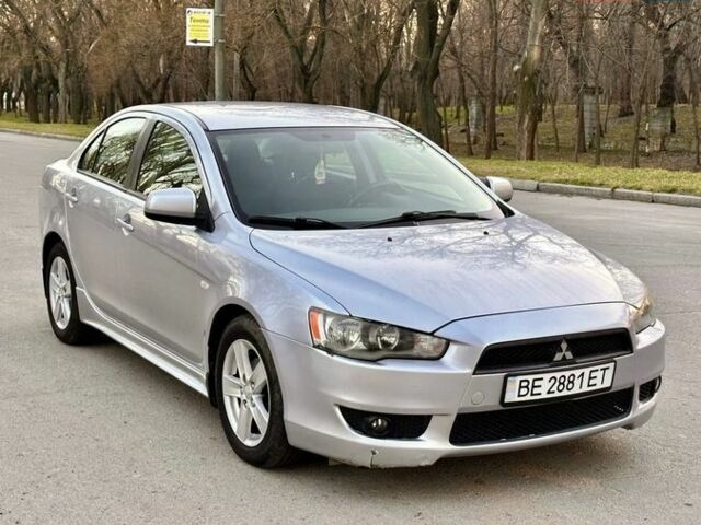 Серый Мицубиси Лансер, объемом двигателя 2 л и пробегом 178 тыс. км за 6150 $, фото 1 на Automoto.ua