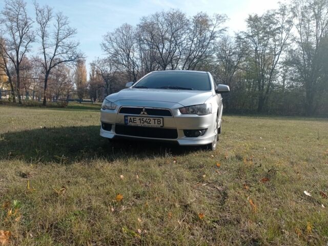 Серый Мицубиси Лансер, объемом двигателя 2 л и пробегом 180 тыс. км за 5800 $, фото 1 на Automoto.ua