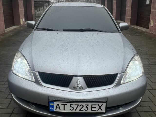 Сірий Міцубісі Lancer, об'ємом двигуна 1.6 л та пробігом 272 тис. км за 4500 $, фото 1 на Automoto.ua