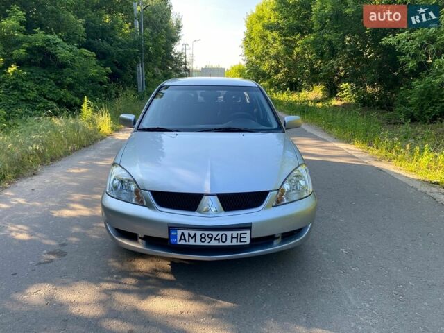 Сірий Міцубісі Lancer, об'ємом двигуна 1.6 л та пробігом 193 тис. км за 5400 $, фото 1 на Automoto.ua