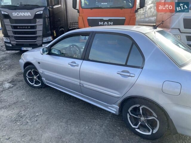 Сірий Міцубісі Lancer, об'ємом двигуна 1.6 л та пробігом 310 тис. км за 3100 $, фото 1 на Automoto.ua