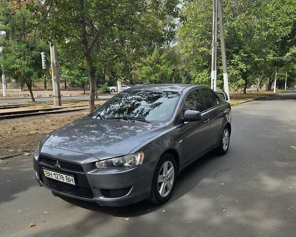 Сірий Міцубісі Lancer, об'ємом двигуна 2 л та пробігом 190 тис. км за 7100 $, фото 1 на Automoto.ua