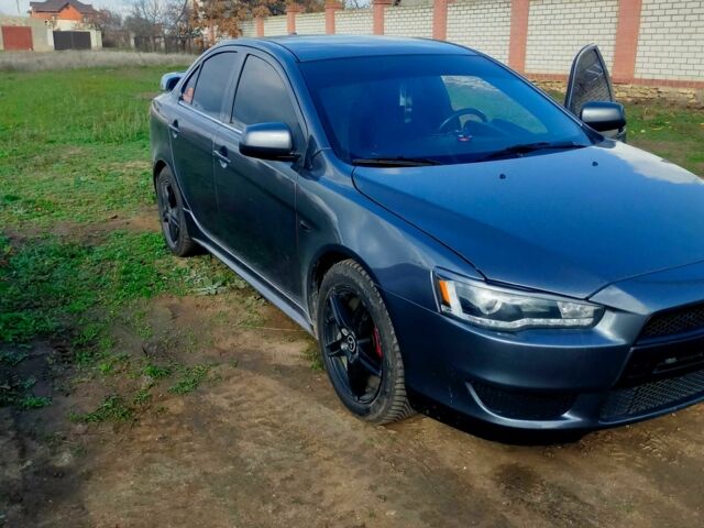 Серый Мицубиси Лансер, объемом двигателя 2 л и пробегом 351 тыс. км за 7000 $, фото 1 на Automoto.ua