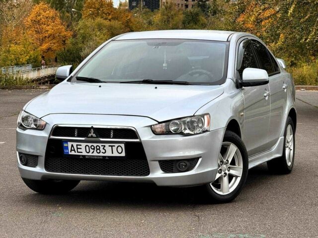 Серый Мицубиси Лансер, объемом двигателя 2 л и пробегом 207 тыс. км за 5800 $, фото 1 на Automoto.ua