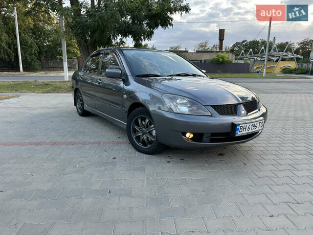 Сірий Міцубісі Lancer, об'ємом двигуна 1.6 л та пробігом 189 тис. км за 6200 $, фото 1 на Automoto.ua
