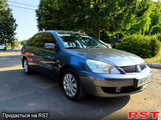 Серый Мицубиси Лансер, объемом двигателя 1.6 л и пробегом 190 тыс. км за 4200 $, фото 1 на Automoto.ua