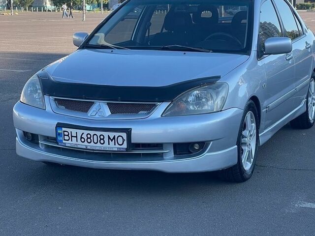 Сірий Міцубісі Lancer, об'ємом двигуна 2 л та пробігом 166 тис. км за 5300 $, фото 1 на Automoto.ua