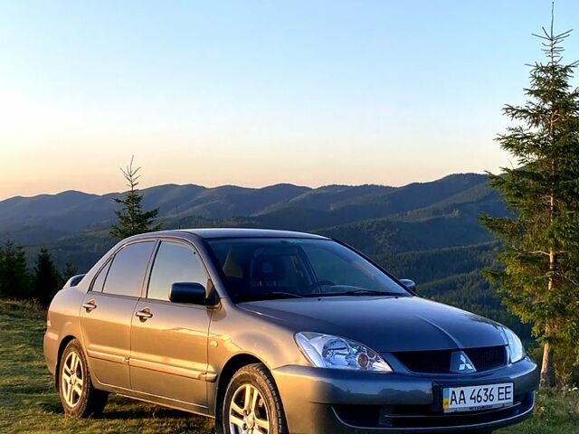 Сірий Міцубісі Lancer, об'ємом двигуна 1.6 л та пробігом 240 тис. км за 4450 $, фото 1 на Automoto.ua