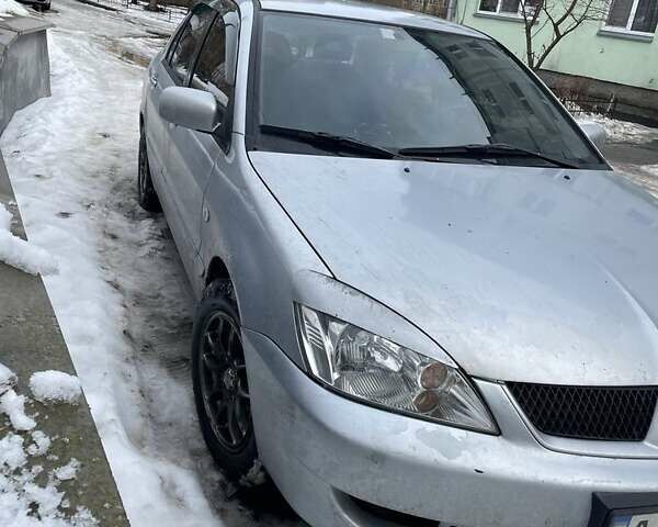 Сірий Міцубісі Lancer, об'ємом двигуна 1.6 л та пробігом 273 тис. км за 2700 $, фото 1 на Automoto.ua