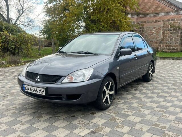 Міцубісі Lancer 2007 у Белой Церкве на Automoto.ua Сірий Міцубісі Lancer, об'ємом двигуна 1.6 л та пробігом 254 тис. км за 3200 $, фото 1 на Automoto.ua