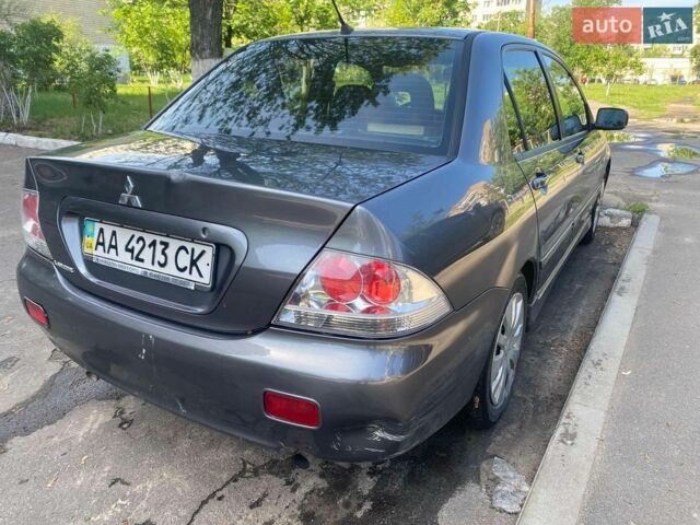 Сірий Міцубісі Lancer, об'ємом двигуна 1.6 л та пробігом 280 тис. км за 2600 $, фото 1 на Automoto.ua