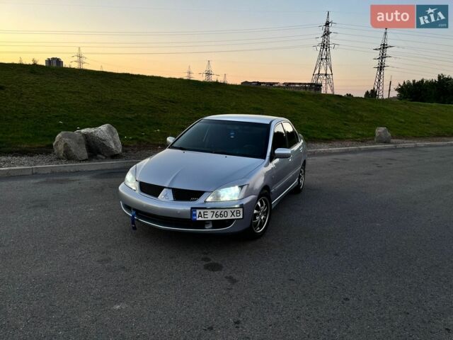 Сірий Міцубісі Lancer, об'ємом двигуна 1.58 л та пробігом 221 тис. км за 3700 $, фото 1 на Automoto.ua