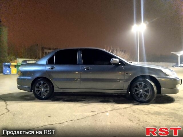 Сірий Міцубісі Lancer, об'ємом двигуна 2 л та пробігом 280 тис. км за 7000 $, фото 1 на Automoto.ua