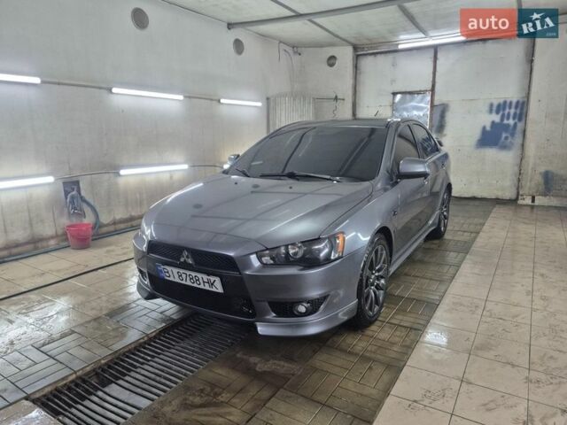 Серый Мицубиси Лансер, объемом двигателя 2 л и пробегом 245 тыс. км за 7700 $, фото 1 на Automoto.ua
