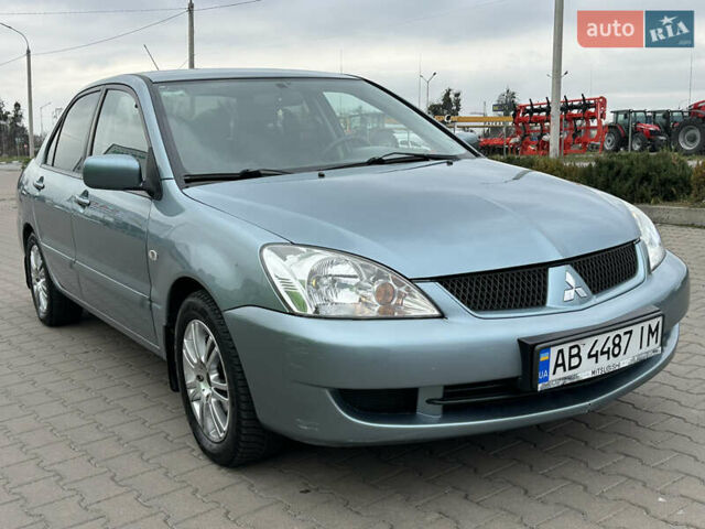 Сірий Міцубісі Lancer, об'ємом двигуна 1.6 л та пробігом 116 тис. км за 5199 $, фото 1 на Automoto.ua