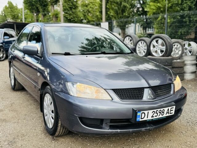 Сірий Міцубісі Lancer, об'ємом двигуна 1.6 л та пробігом 1 тис. км за 3600 $, фото 1 на Automoto.ua