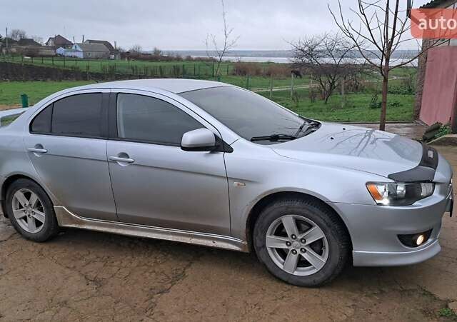 Сірий Міцубісі Lancer, об'ємом двигуна 2 л та пробігом 226 тис. км за 5999 $, фото 1 на Automoto.ua