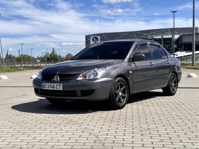 Сірий Міцубісі Lancer, об'ємом двигуна 1.6 л та пробігом 325 тис. км за 2500 $, фото 1 на Automoto.ua