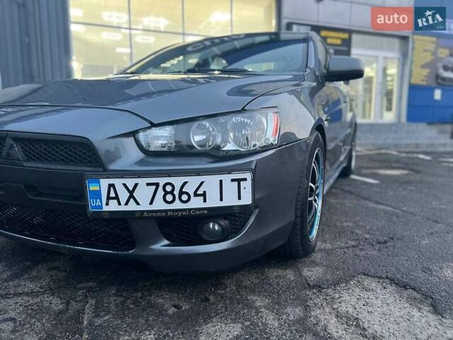 Серый Мицубиси Лансер, объемом двигателя 2 л и пробегом 170 тыс. км за 6999 $, фото 1 на Automoto.ua