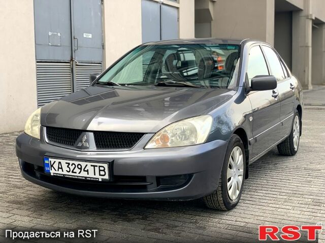 Сірий Міцубісі Lancer, об'ємом двигуна 1.6 л та пробігом 225 тис. км за 4200 $, фото 1 на Automoto.ua