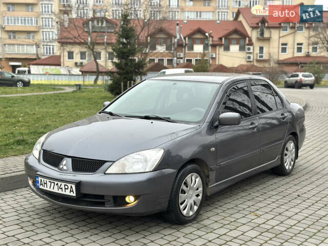 Сірий Міцубісі Lancer, об'ємом двигуна 1.6 л та пробігом 177 тис. км за 2800 $, фото 1 на Automoto.ua