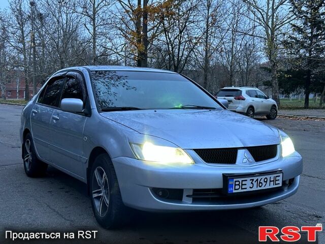 Сірий Міцубісі Lancer, об'ємом двигуна 1.6 л та пробігом 205 тис. км за 4500 $, фото 1 на Automoto.ua