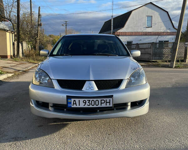 Мицубиси Лансер 2007 в Василькове на Automoto.ua Серый Мицубиси Лансер, объемом двигателя 2 л и пробегом 177 тыс. км за 5399 $, фото 1 на Automoto.ua