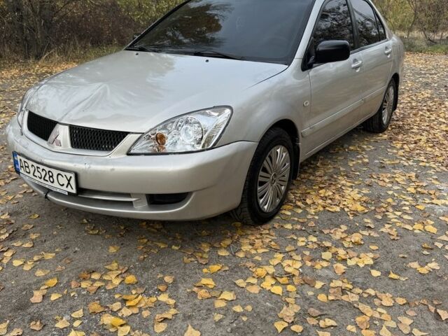 Сірий Міцубісі Lancer, об'ємом двигуна 1.6 л та пробігом 180 тис. км за 2500 $, фото 1 на Automoto.ua
