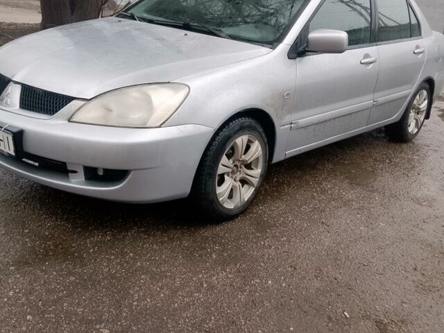 Серый Мицубиси Лансер, объемом двигателя 0 л и пробегом 283 тыс. км за 3350 $, фото 1 на Automoto.ua