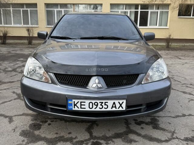 Серый Мицубиси Лансер, объемом двигателя 1.6 л и пробегом 202 тыс. км за 4600 $, фото 1 на Automoto.ua
