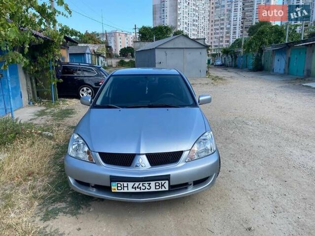Сірий Міцубісі Lancer, об'ємом двигуна 1.6 л та пробігом 381 тис. км за 3350 $, фото 1 на Automoto.ua