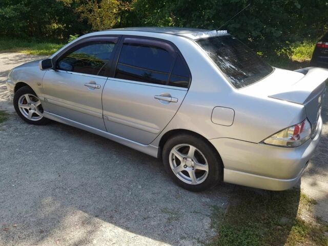 Сірий Міцубісі Lancer, об'ємом двигуна 1.6 л та пробігом 340 тис. км за 3250 $, фото 1 на Automoto.ua