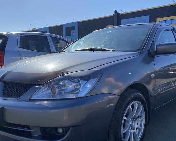 Сірий Міцубісі Lancer, об'ємом двигуна 1.6 л та пробігом 293 тис. км за 5000 $, фото 1 на Automoto.ua